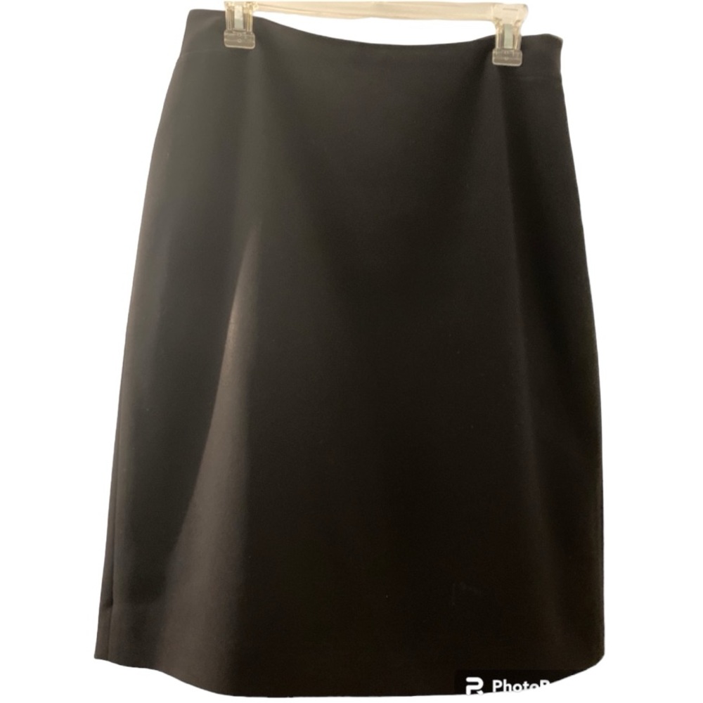 Ann Taylor skirt, fully lined. A-Line.,Black. Pleats in back at hem. Never worn.